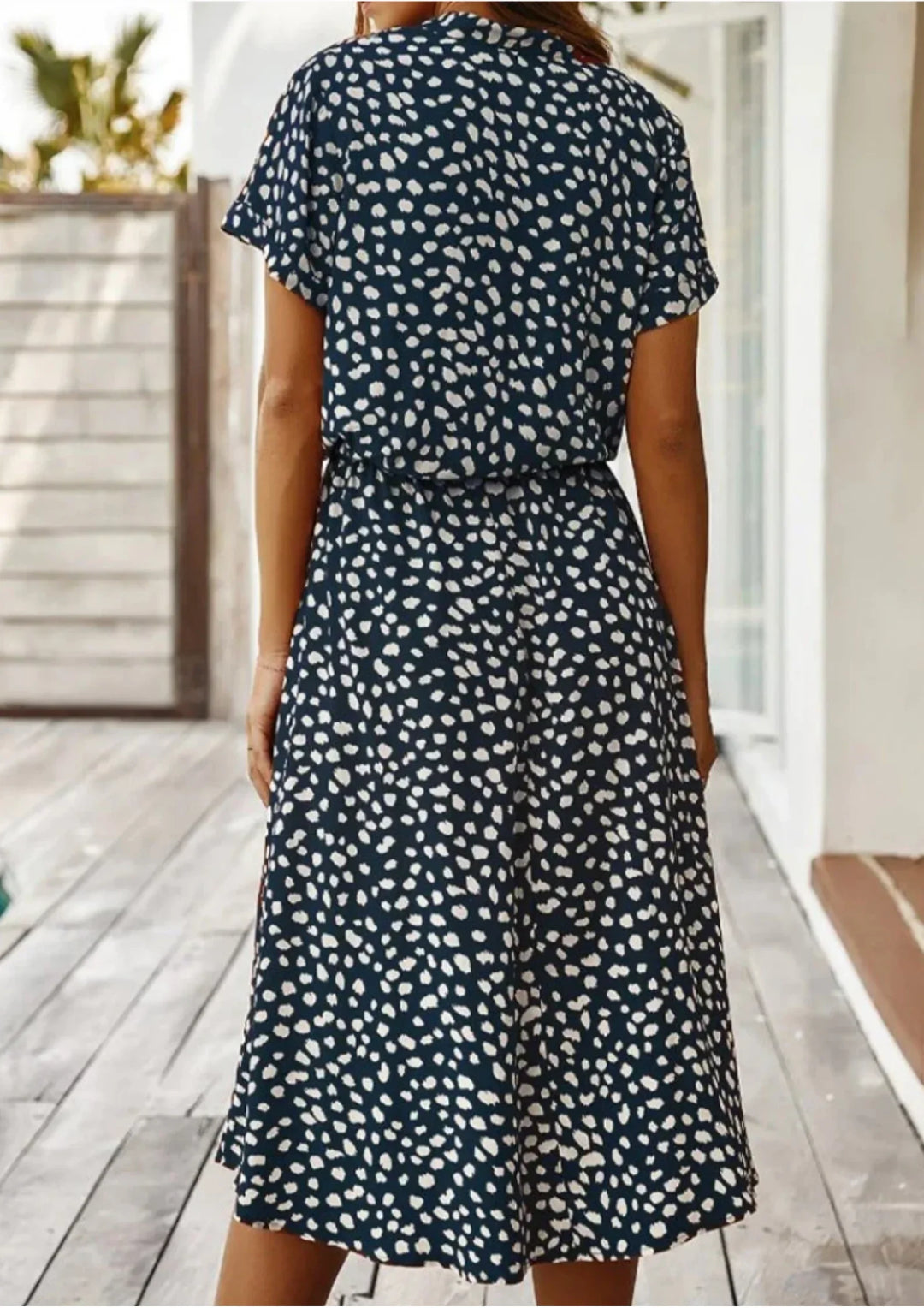 Smart casual women's spotted print midi dress. Button-down, elegant, with a functional drawstring waist.