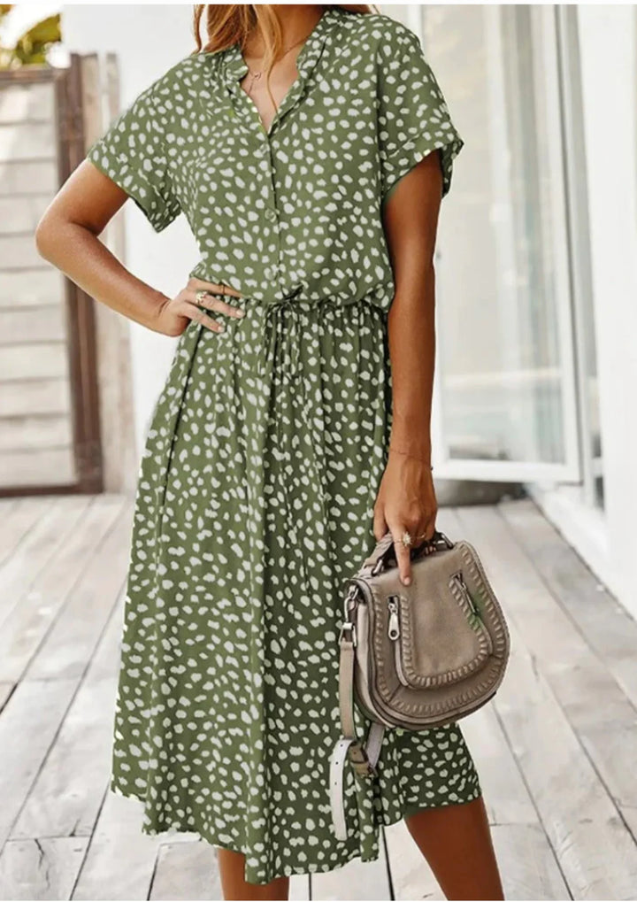 Flowy women's spotted print midi dress with button-down front and adjustable drawstring waist.
