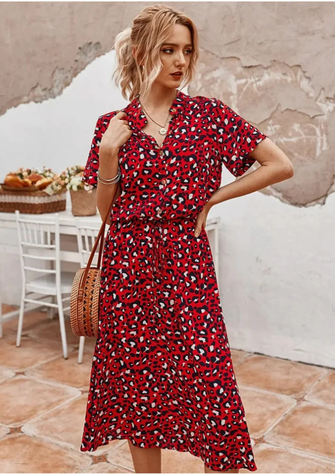 Women's button-down spotted print midi dress. Drawstring waist & flowy design for elegance.