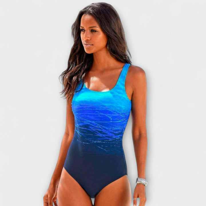 Women's Stella Active One-Piece Swimsuit, gradient design. Sporty & chic swimwear for summer beach days.