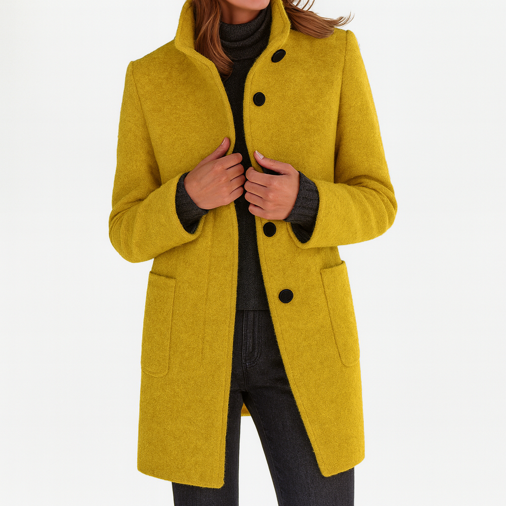 Minimalist women's straight cut mid-length coat with button front, an elegant fall fashion staple.