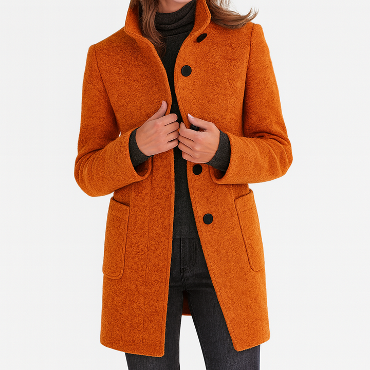 Well-tailored women's straight cut mid-length coat with button front, a chic fall outerwear option.