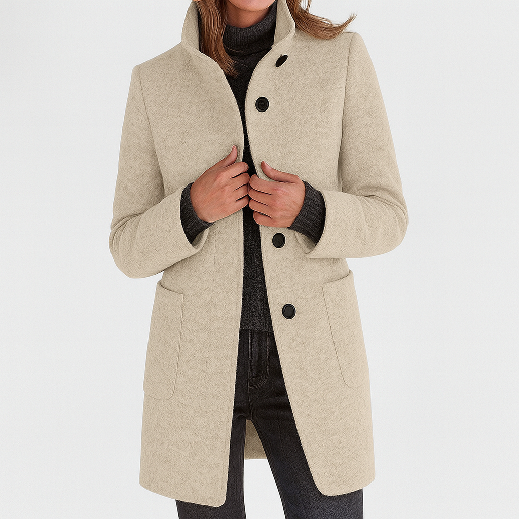 Straight cut women's mid-length button-front coat, a versatile & elegant fall jacket.