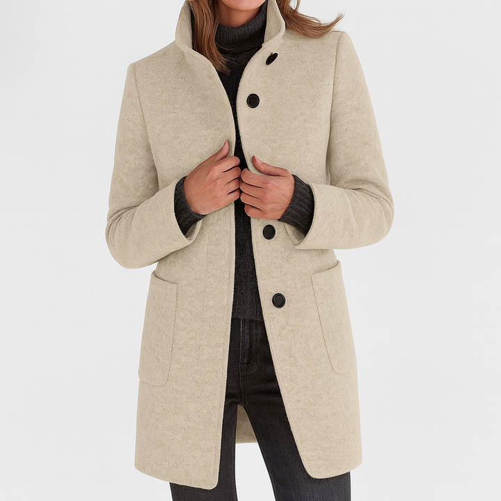 Straight cut women's mid-length button-front coat, a versatile & elegant fall jacket.