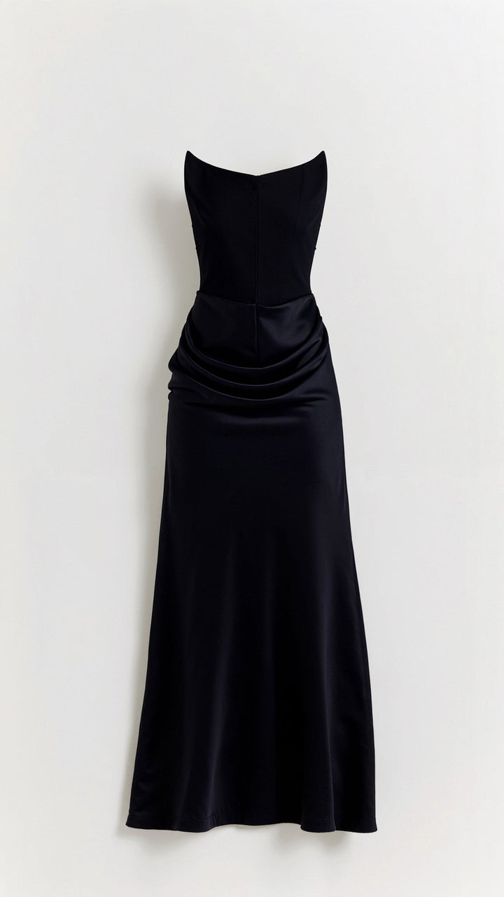 Figure-hugging strapless bodycon maxi dress for women, offering a sophisticated look for formal events and fashion.