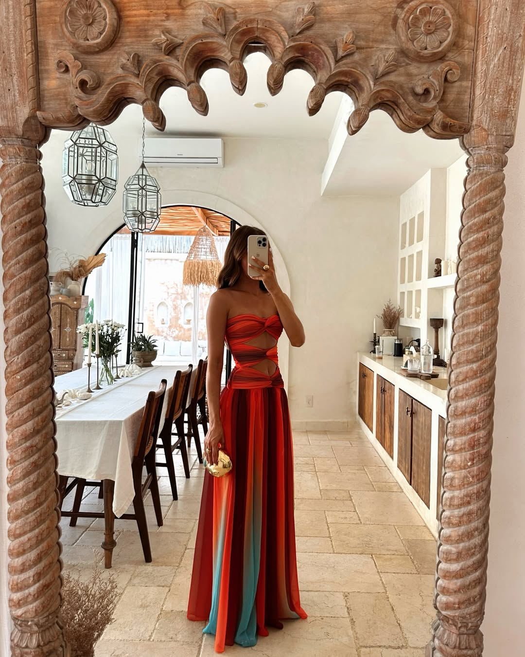 Flowing women's strapless maxi dress with trendy cut outs, a versatile summer dress for various occasions.