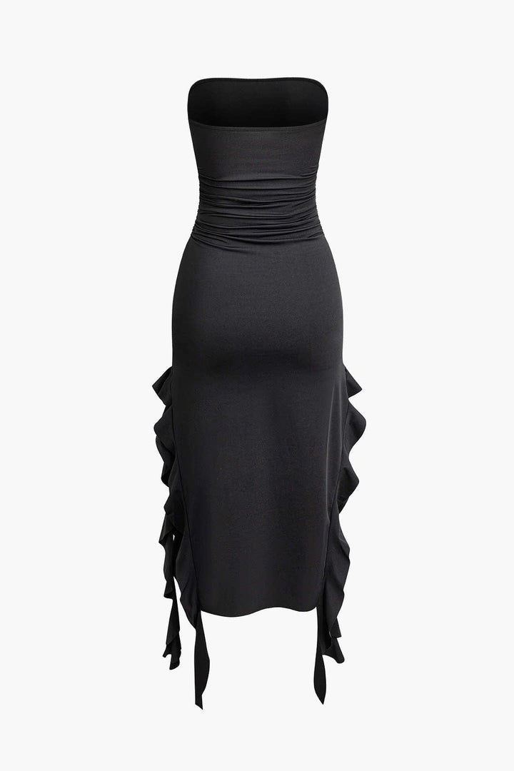 Fashionable women's strapless bodycon midi with fringe hem, perfect for evening events.