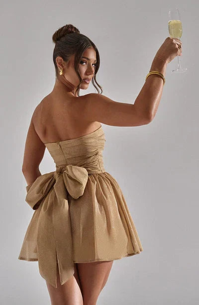 Chic strapless glitter A-line mini dress for women. A festive party dress for dazzling celebrations.