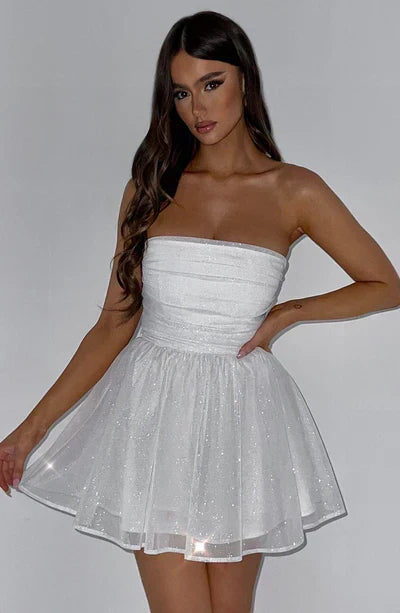 Women's strapless glitter A-line mini dress. A festive and elegant party dress for women's celebrations.