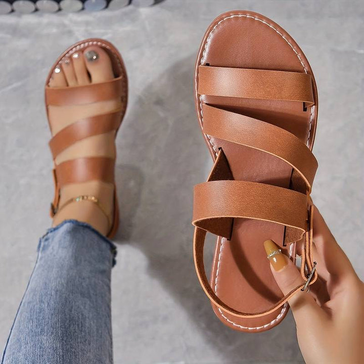 Effortless summer style: Women's casual flat sandals made from soft vegan material.
