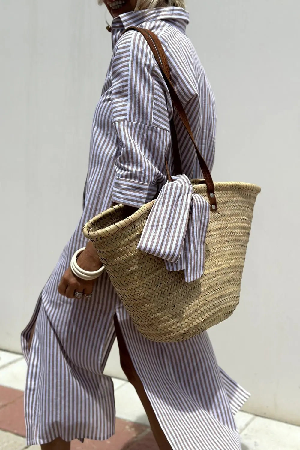 Striped button-down midi shirt dress for women. Collared, casual style, perfect as a summer or everyday dress.