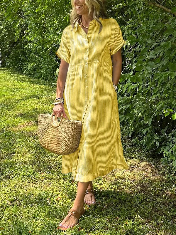 Chic women's striped midi dress, featuring a classic button front. A comfortable, flowy choice for summer fashion.
