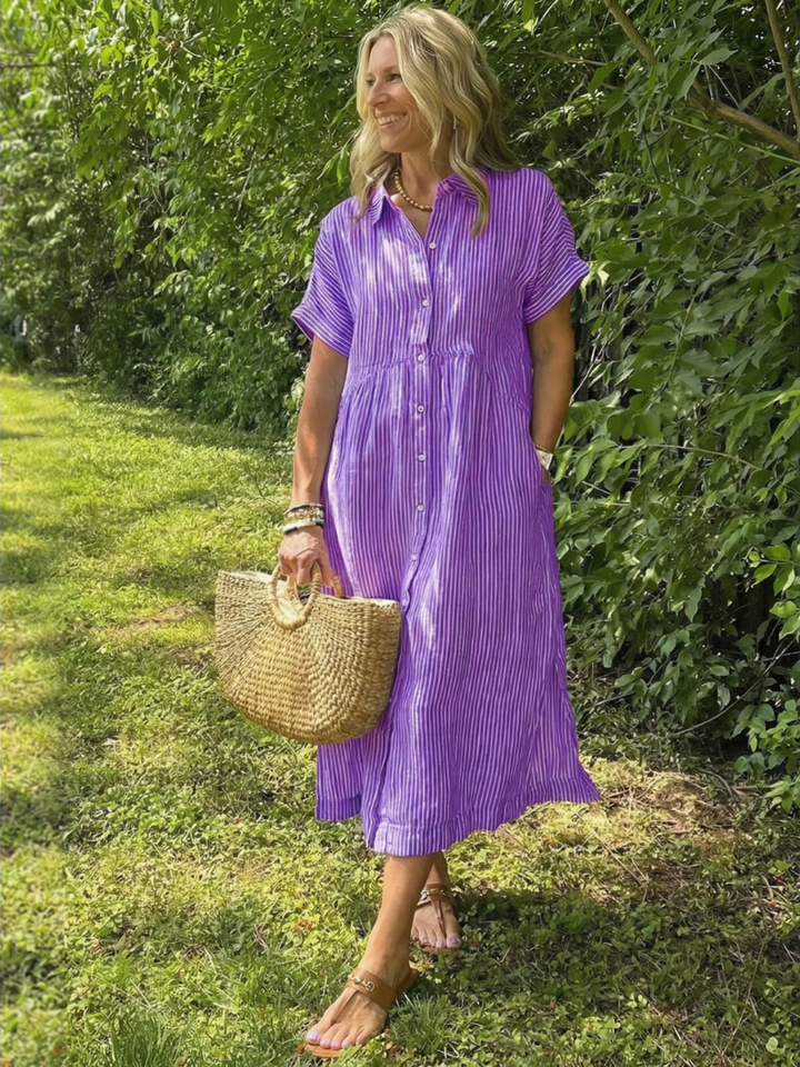 Relaxed fit women's striped midi dress, button front, short sleeves. Great for everyday wear or travel.