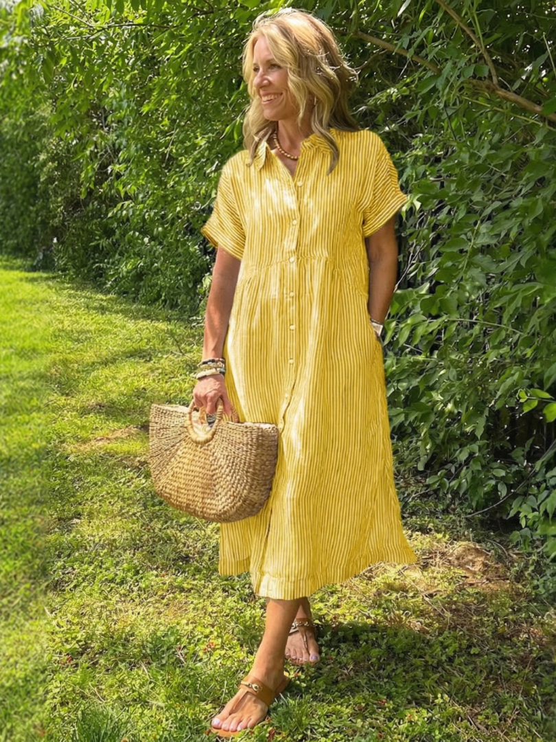 Stylish women's striped short sleeve midi dress with full button front. Versatile for casual, summer & travel.