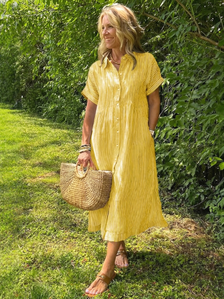 Stylish women's striped short sleeve midi dress with full button front. Versatile for casual, summer & travel.