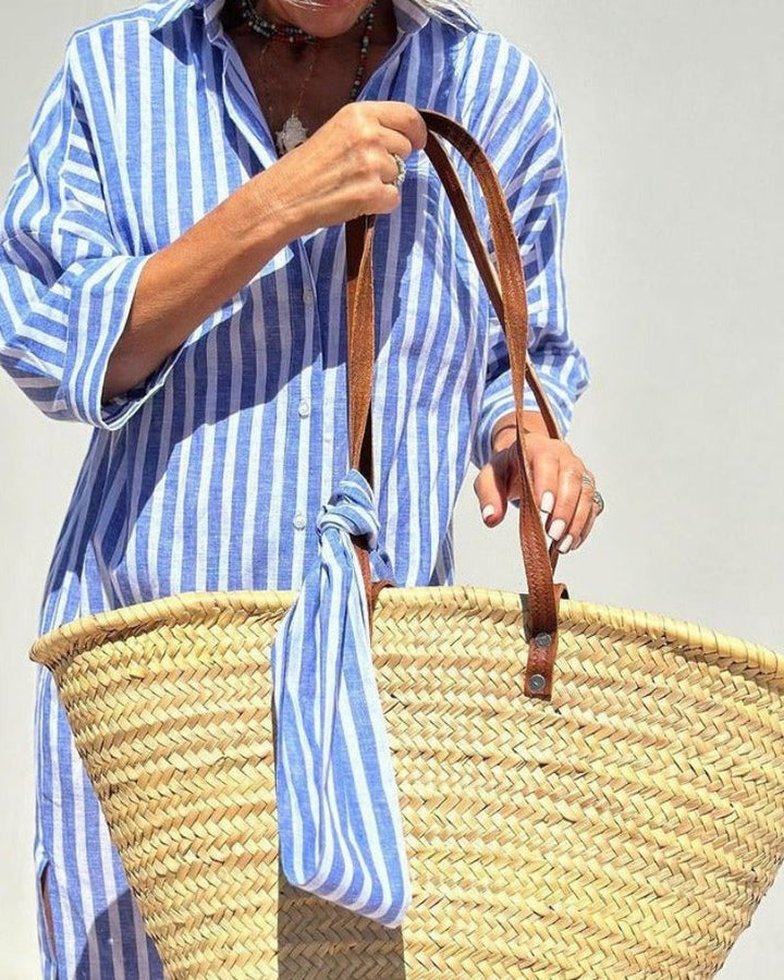 Stylish women's summer striped button front midi shirt dress. Casual & elegant for warm weather outfits.