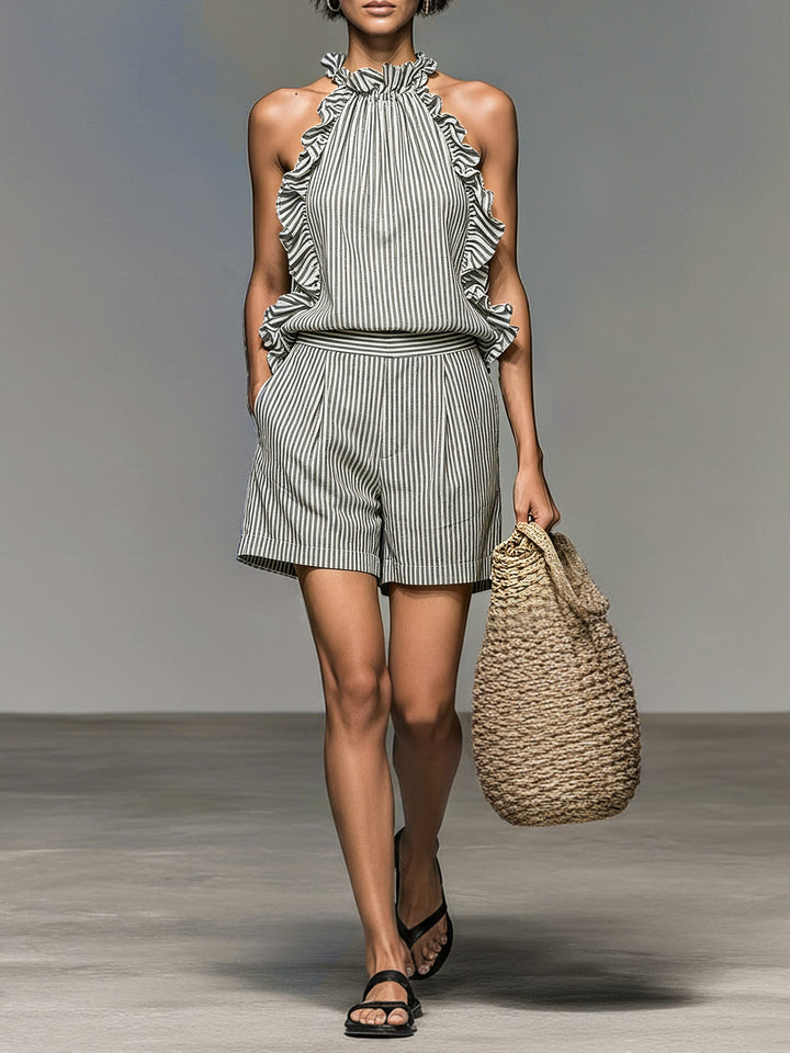 Women's striped halterneck top & matching shorts set with playful ruffles. Perfect chic summer vacation outfit.