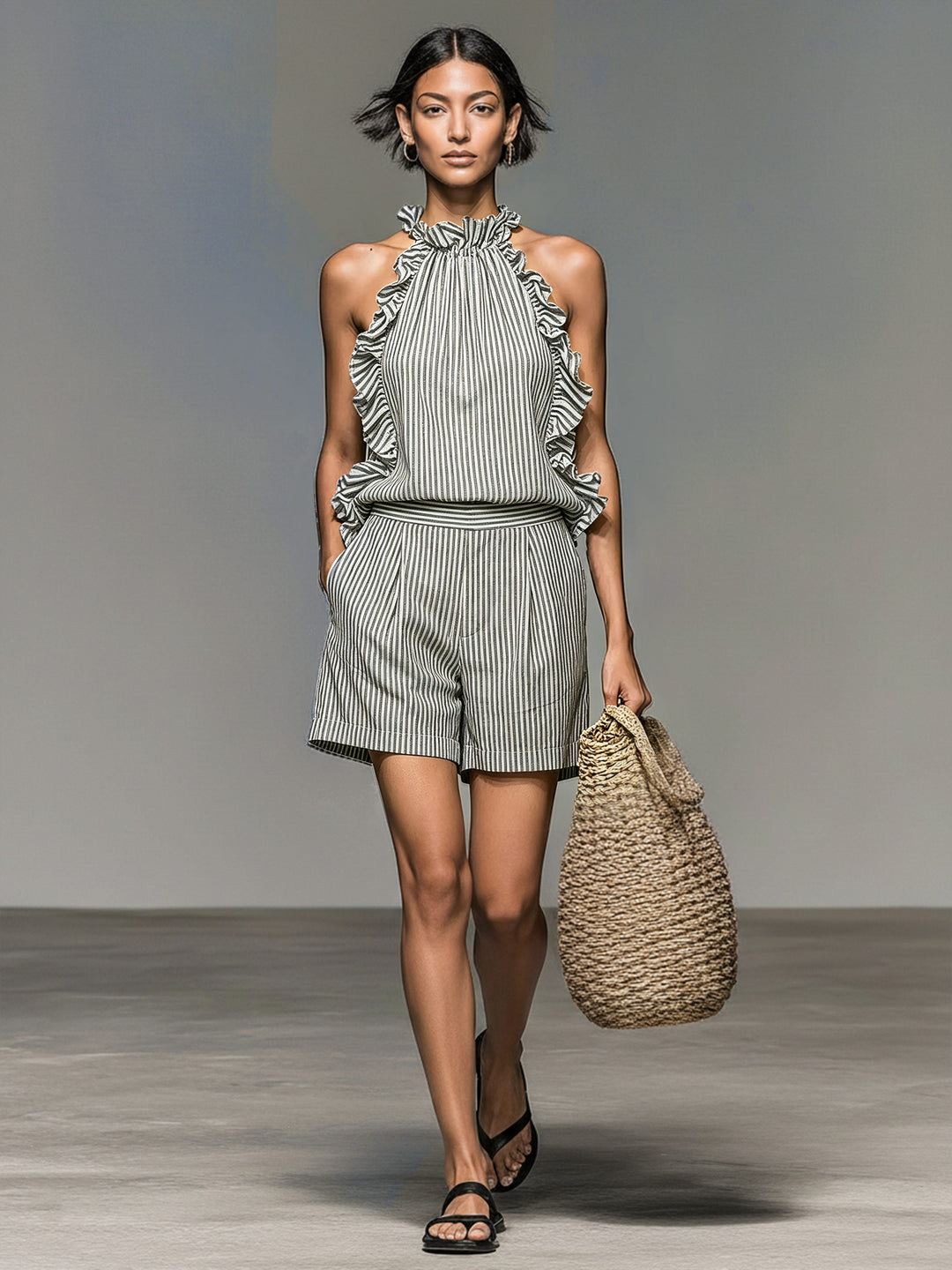 Stylish women's two-piece striped halter top & ruffly shorts set. Ideal comfy fashion for casual or resort wear.