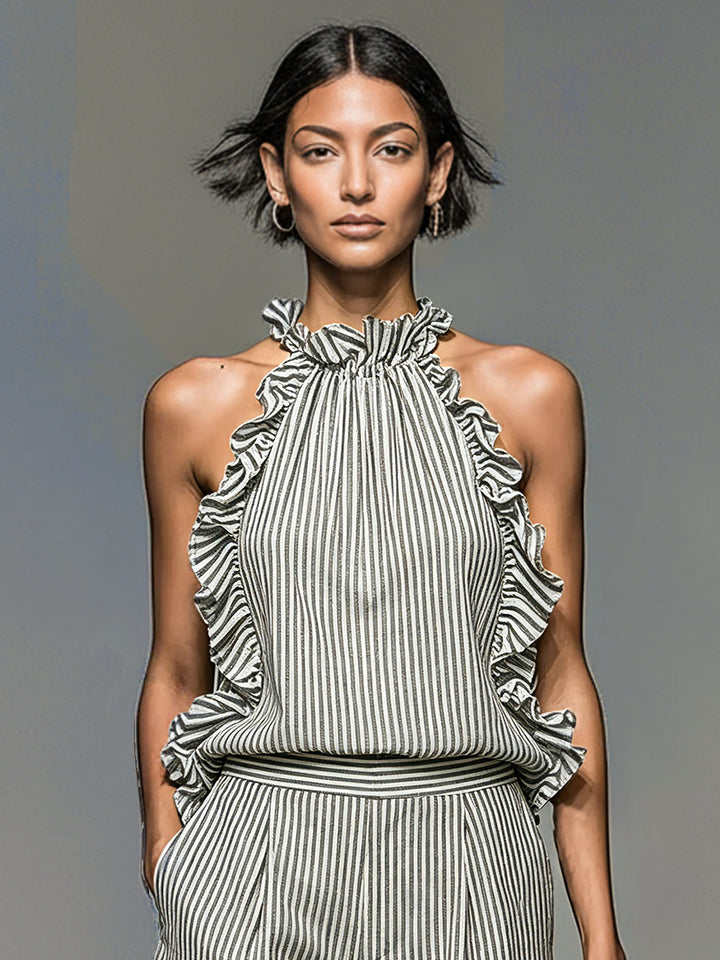 Chic women's matching set: striped halterneck top with ruffles and coordinating comfy shorts for summer.