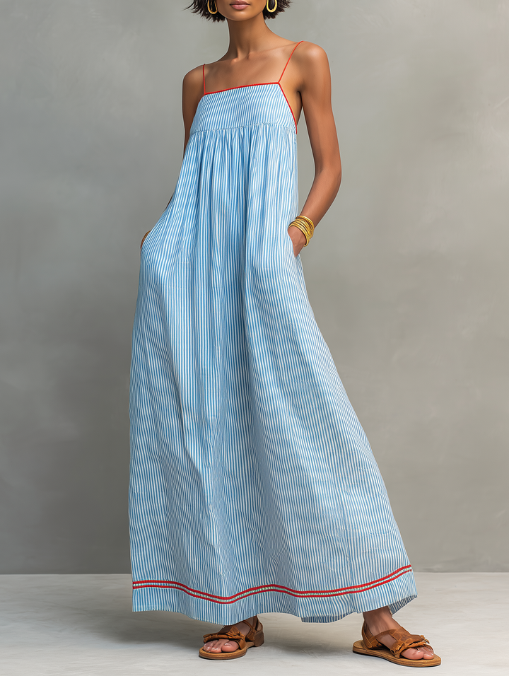 Women's striped maxi dress with spaghetti straps, gathered waist. Perfect for summer casual wear.