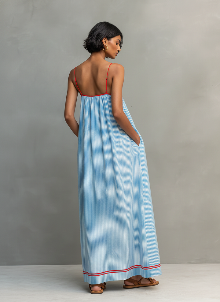 Comfortable women's striped maxi dress with thin straps & gathered detail, ideal for summer & holiday.