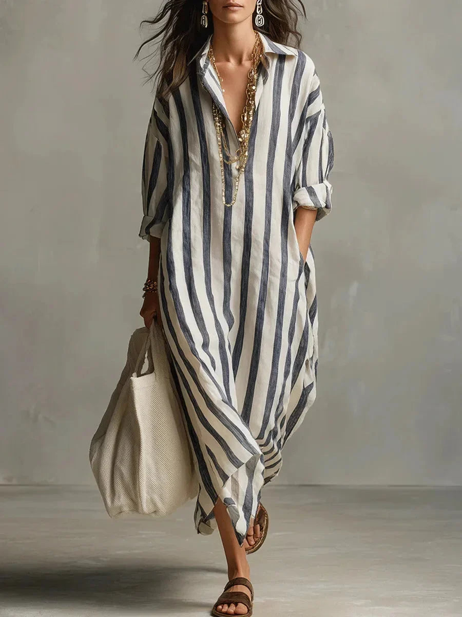 Women's striped maxi shirt dress with roll-tab sleeves, perfect for casual summer wear or elegant resort days.