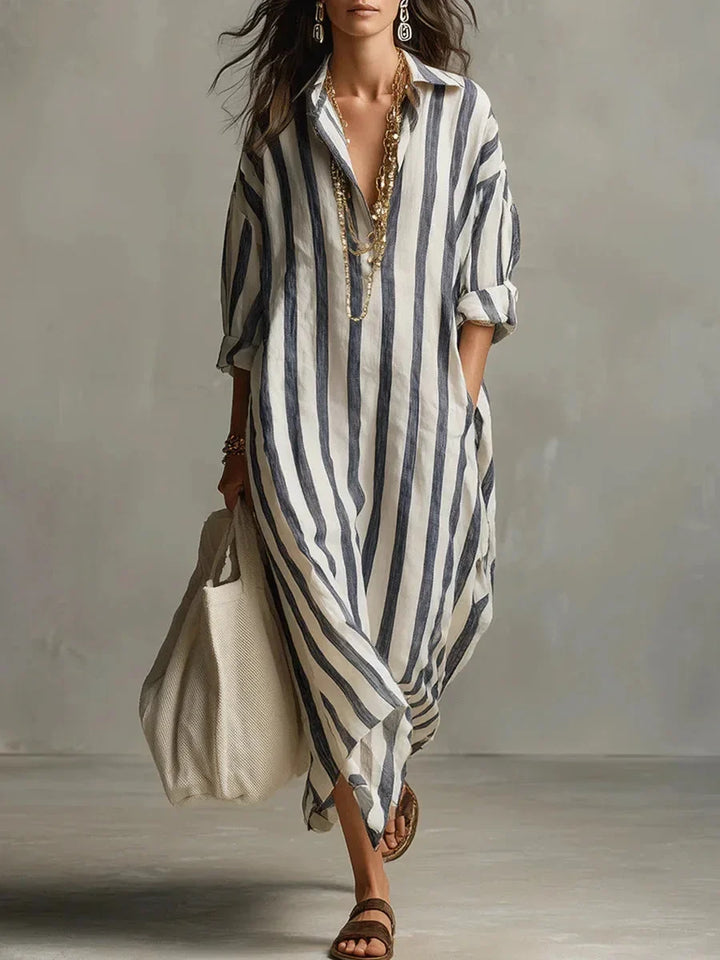 Women's striped maxi shirt dress with roll-tab sleeves, perfect for casual summer wear or elegant resort days.