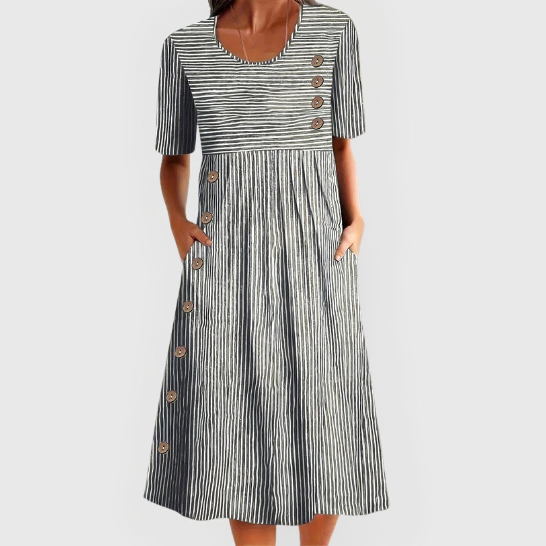 Comfortable women's striped midi dress with 3/4 sleeves, ideal for versatile day wear.