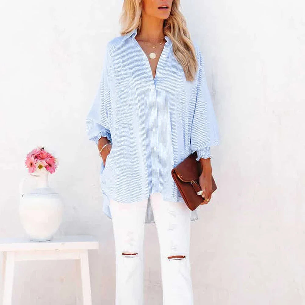 Versatile women's striped button-down top with a relaxed oversized fit and elegant shirred sleeves.