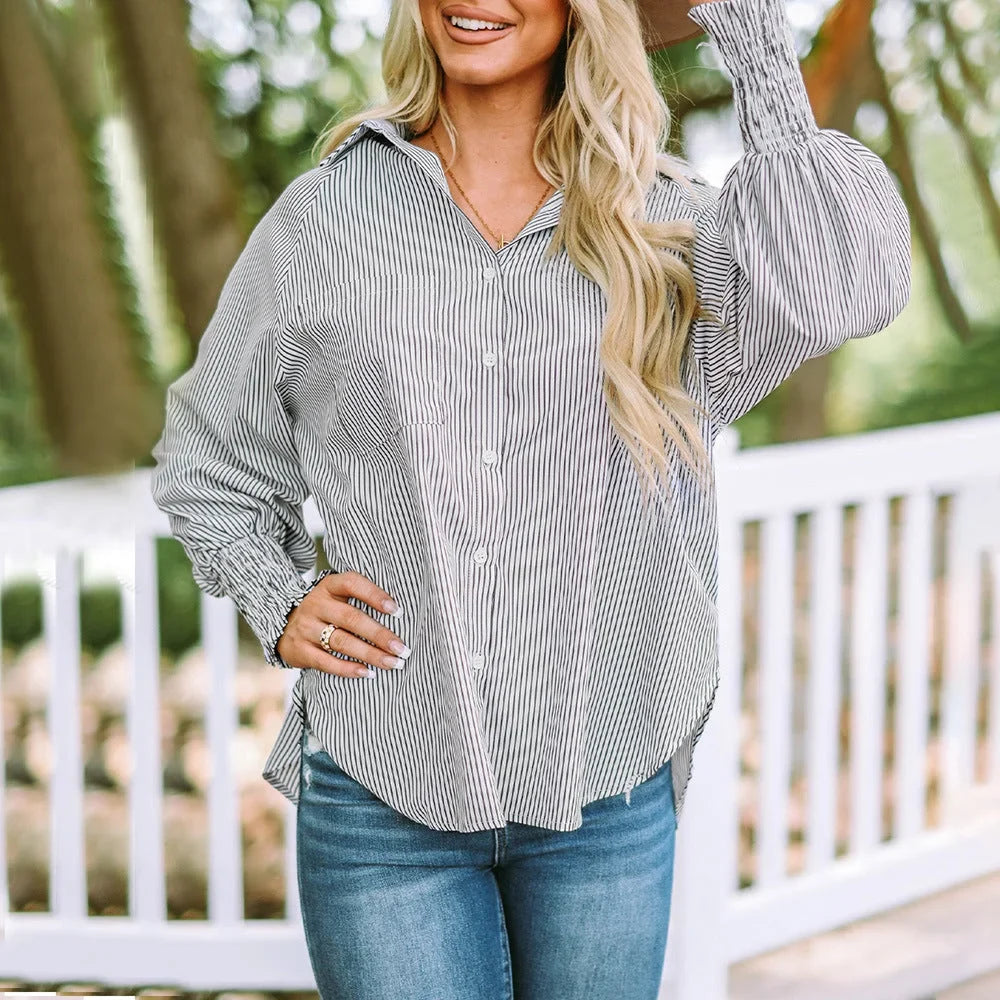 Spring fashion: Women's oversized striped shirt, button-down with unique shirred balloon sleeves.