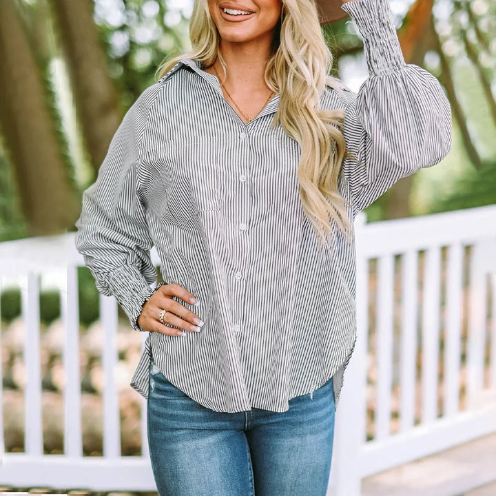 Spring fashion: Women's oversized striped shirt, button-down with unique shirred balloon sleeves.