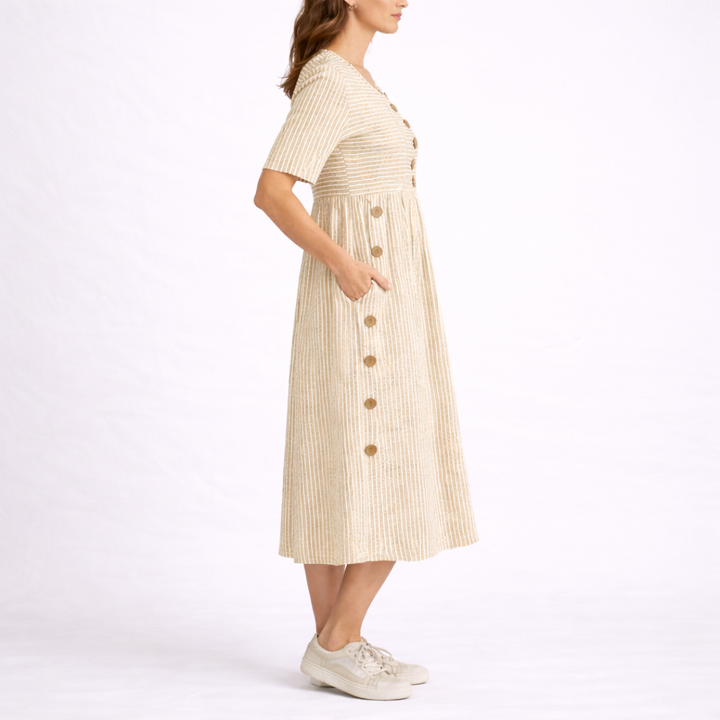 Stylish striped midi dress with a flattering scoop neck, short sleeves, and practical side pockets.