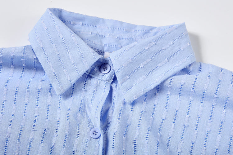 Trendy striped women's two-piece set, a loose-fit shirt & shorts, ideal for warm weather vacations.