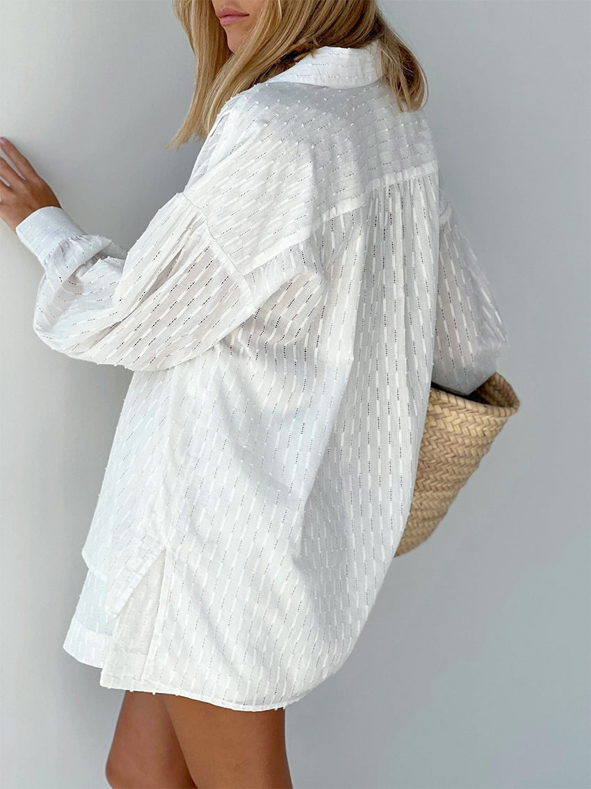 Lightweight striped summer set for women, featuring a relaxed long-sleeve shirt and comfortable shorts.