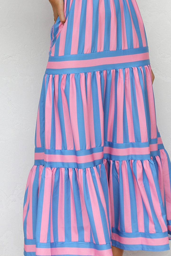 Chic women's striped tiered maxi dress, featuring a comfortable flowy design & spaghetti straps for summer.