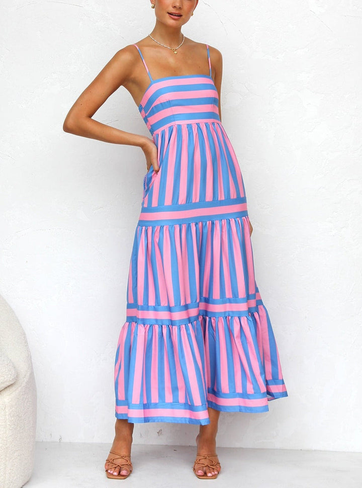Versatile women's striped tiered maxi dress, suitable as a casual summer dress or elegant evening wear.
