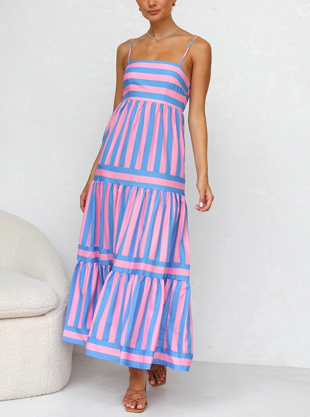 Women's striped tiered maxi dress, perfect for summer, vacation, or a casual evening out.