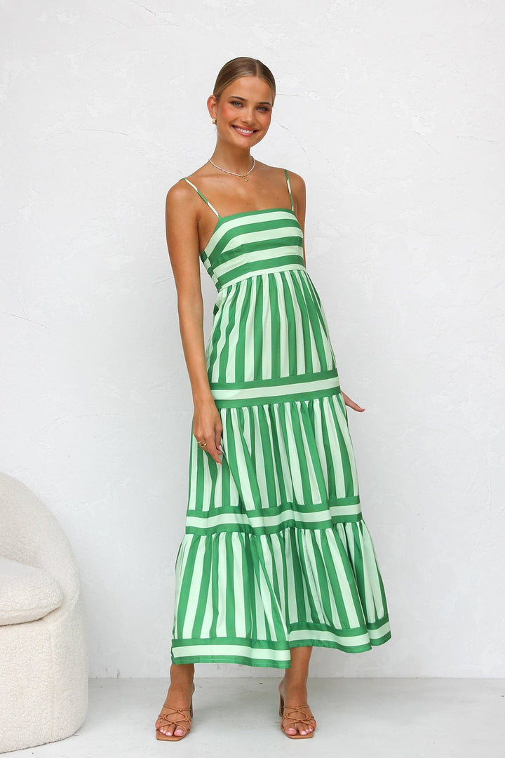 Casual women's tiered maxi dress, featuring chic stripes and a comfortable flowy design for summer.