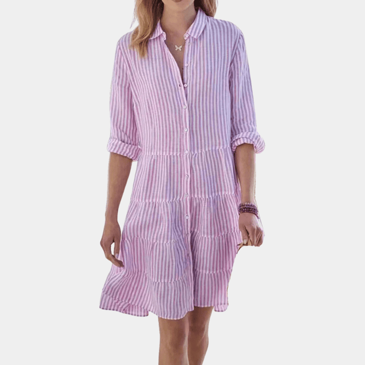 Stylish women's midi striped tiered shirt dress. Features a button-up design, perfect for warm weather & casual outings.