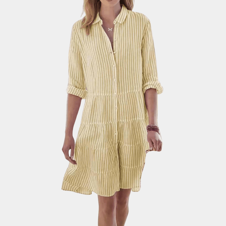 Relaxed fit striped tiered shirt dress for women. Button-up detail, perfect for a breezy, casual summer look. Midi style.