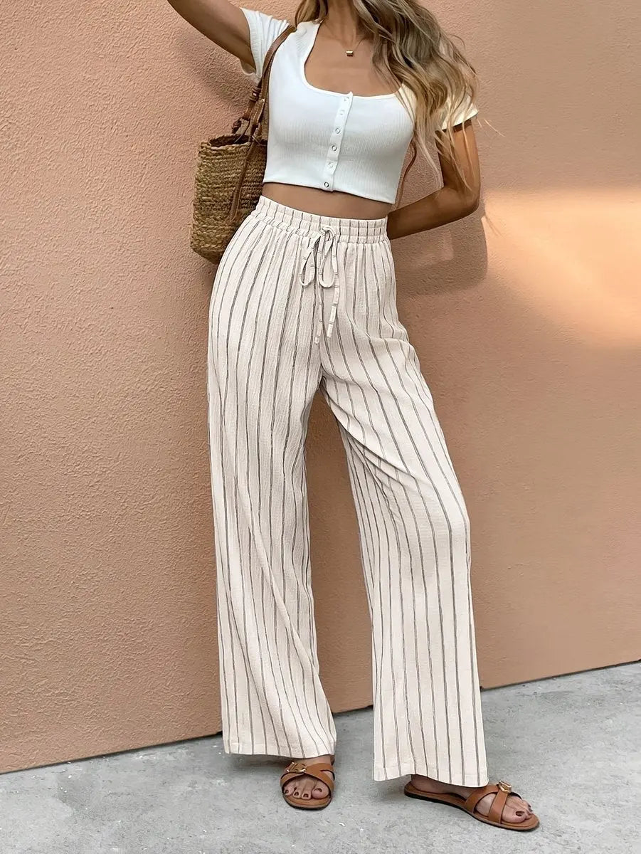 Women's striped wide leg linen trousers with elastic waist & drawstring, perfect for casual summer comfort & style.
