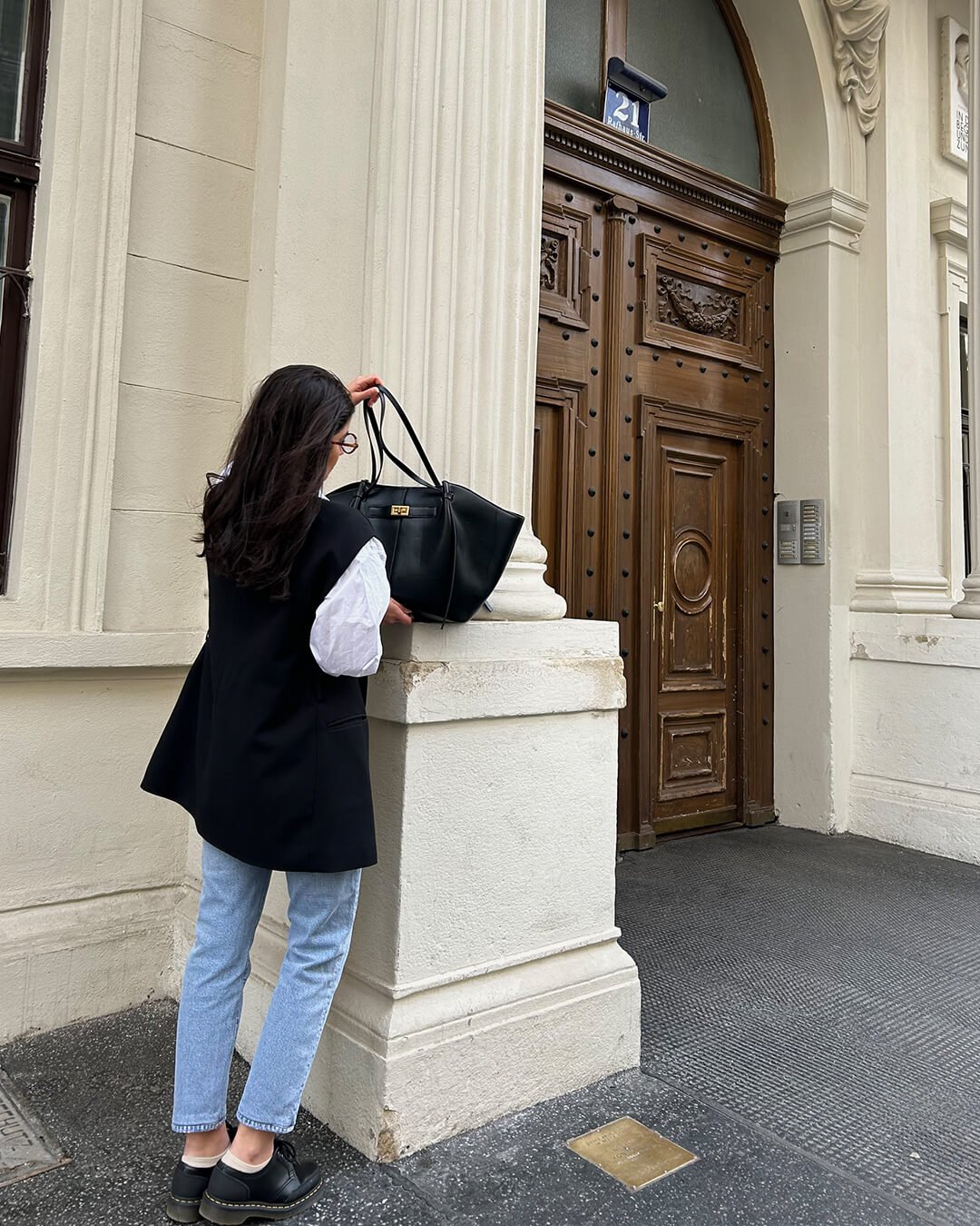 Premium women's structured shoulder bag, with elegant gold-tone accents; ideal for professional women.