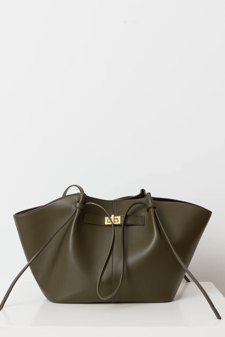 Women's large capacity structured shoulder bag with elegant gold hardware, a timeless fashion accessory.