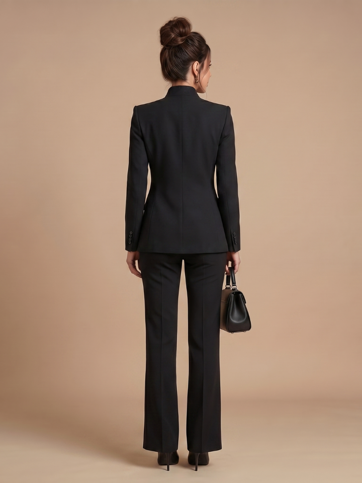 White women's professional tailored suit, structured stand collar, perfect for an elegant business look.