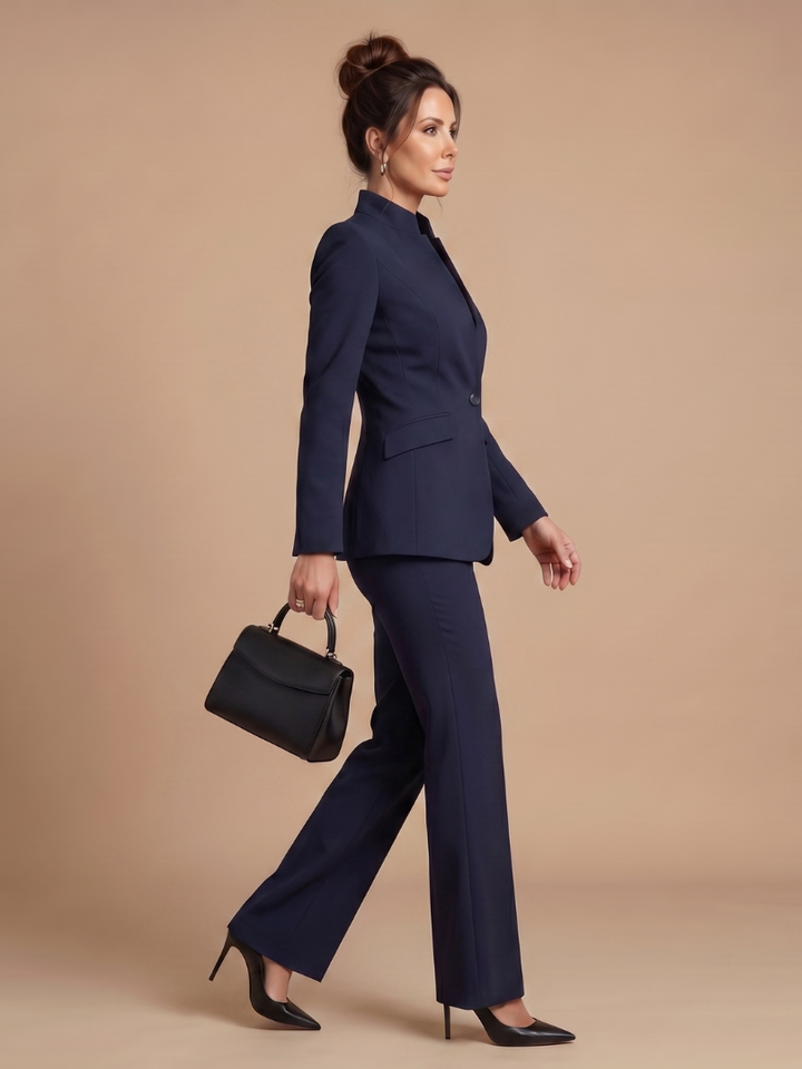 Professional women's navy stand collar tailored suit. Flared trousers for a sophisticated office fashion statement.