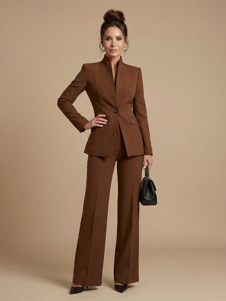 Professional black women's business suit, structured stand collar, tailored fit. Modern office fashion.