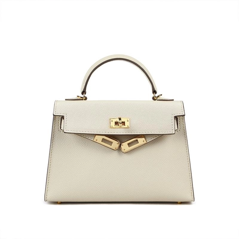 Smart structured women's handbag with an ergonomic top handle and a striking, secure gold lock.