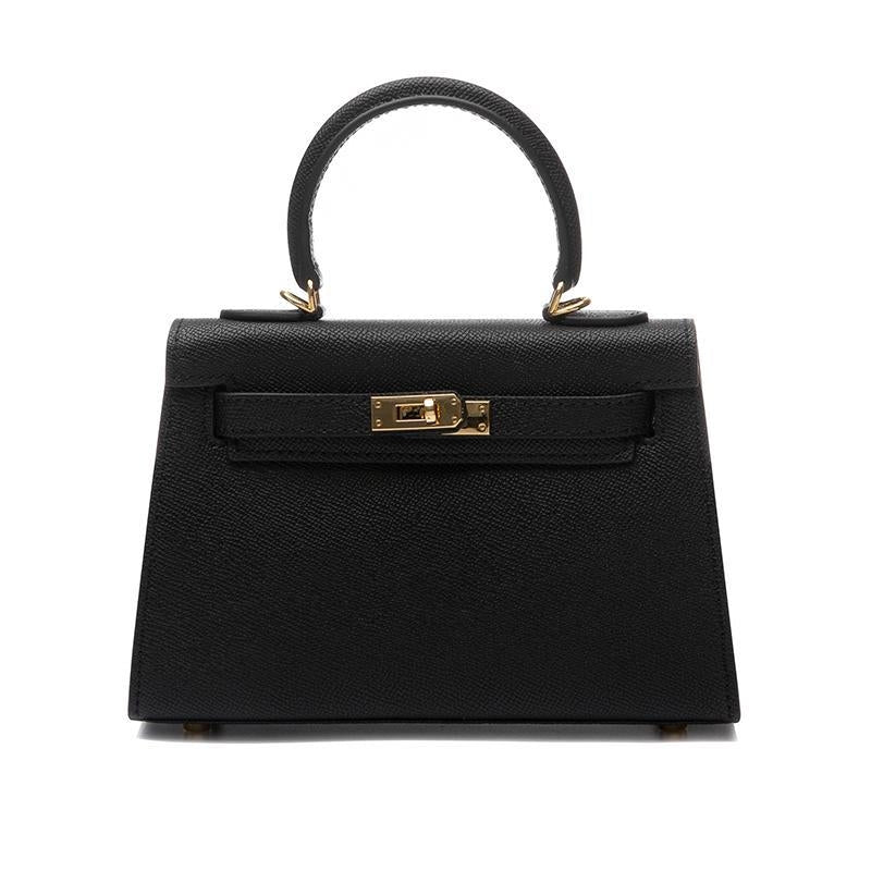 Elegant women's handbag: structured design, comfortable top handle, stylish gold lock. Ideal for any occasion.