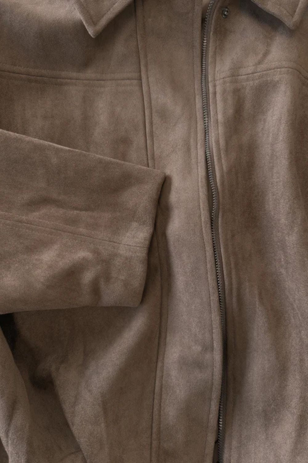 Olive structured volume bomber jacket for women, combining modern design with versatile casual and elegant wear.