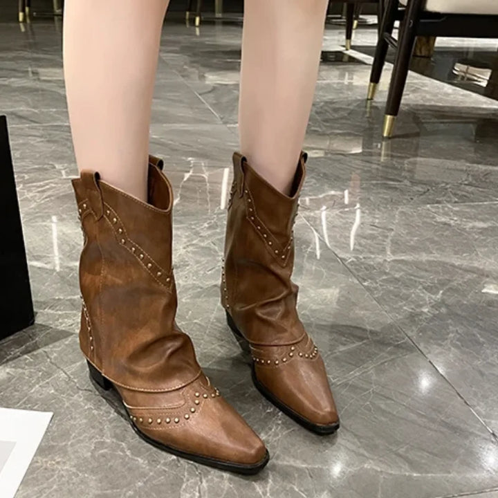 Brown studded western boots, women's, featuring a block heel and stylish pointed toe.